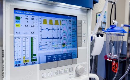 hospital monitors displaying vital signs, including heart rate, oxygen levels, and blood pressure. Represents the precision and urgency of medical care, life monitoring, and patient well-being