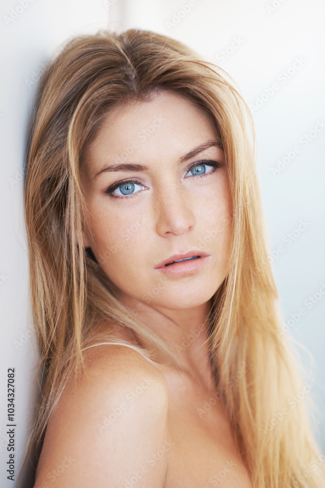 Aesthetic, portrait and skincare with woman in studio for dermatology, natural cosmetics or wellness. Beauty, blue eyes and face of confident model on white background for collagen or cosmetology Aesthetic, portrait and skincare with woman in studio for dermatology, natural cosmetics or wellness. Beauty, blue eyes and face of confident model on white background for collagen or cosmetology