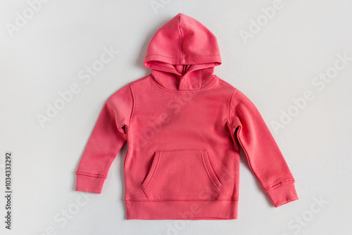 Red sweatshirt mockup on the white background. Template sweatshirt front for design and print. Hoodie with pocket, long sleeve.  Basic clothing witout logo. Top view photo