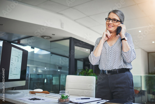 Business, mature woman and happy on phone call at office with conversation for consultation and communication. Female person, employee and ceo with connection, networking and advice as copywriter photo