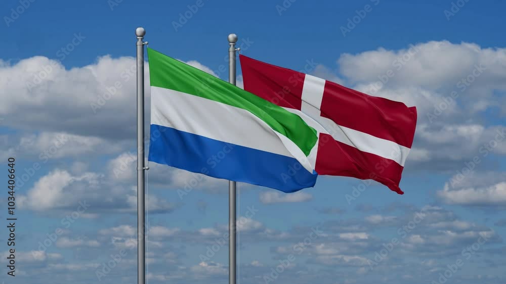 Denmark and Sierra Leone flags flying together, video concept of the relationship, two country relations concept Denmark and Sierra Leone flags flying together, video concept of the relationship, two country relations concept