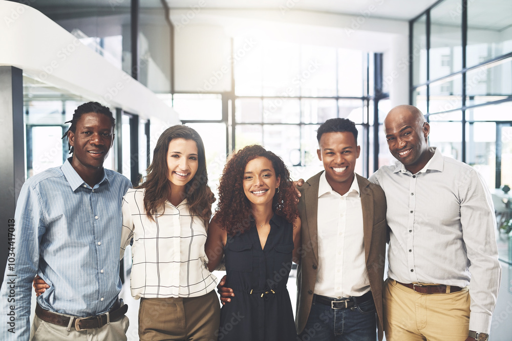 Happy, teamwork and portrait of business people in office for about us, collaboration and partnership. Corporate workers, diversity and men and women hug for professional career, company and pride Happy, teamwork and portrait of business people in office for about us, collaboration and partnership. Corporate workers, diversity and men and women hug for professional career, company and pride