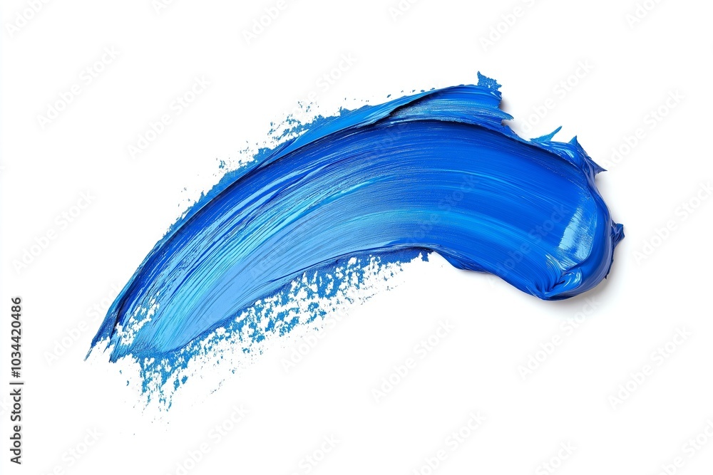 Blue paint stroke with smooth, flowing texture and subtle splashes on a white background, evoking a sense of motion and creativity
