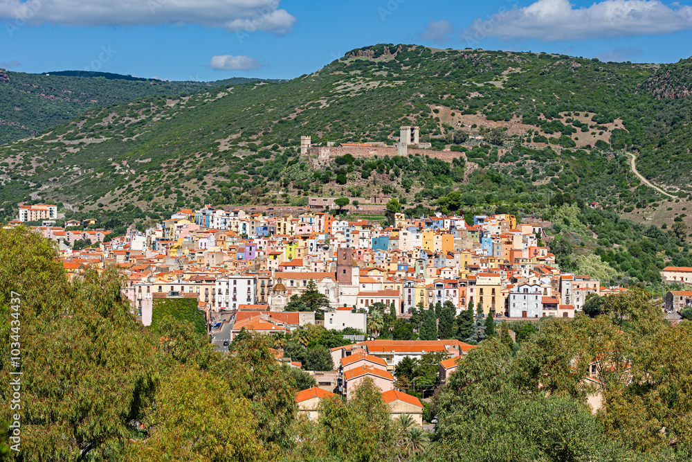 Fototapeta premium Colorful buildings of Bosa with the Castle of Serravalle. Oristano, Sardinia, Italy
