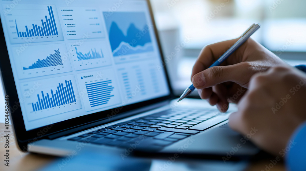 An analyst uses a computer and dashboard for data business analysis An analyst uses a computer and dashboard for data business analysis