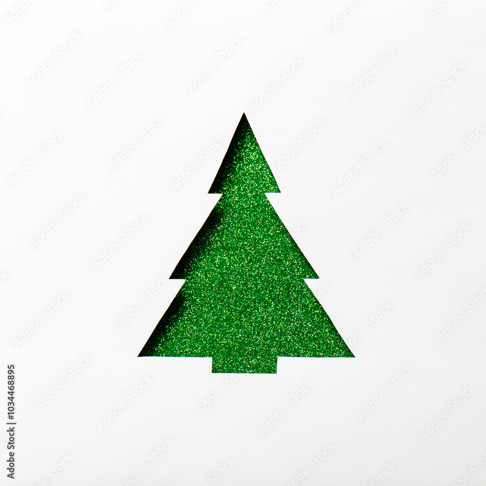 Christmas tree with green glitter, cut out on a white background. Christmas card. Mockup for festive advertising and greetings. Christmas tree with green glitter, cut out on a white background. Christmas card. Mockup for festive advertising and greetings.
