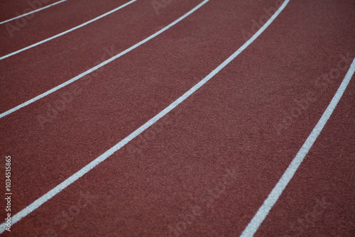 Red rubber track and field lines, lanes background texture