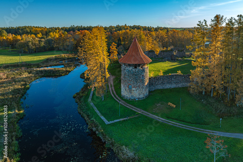 Castle ruins and tower in Ergeme parish photo