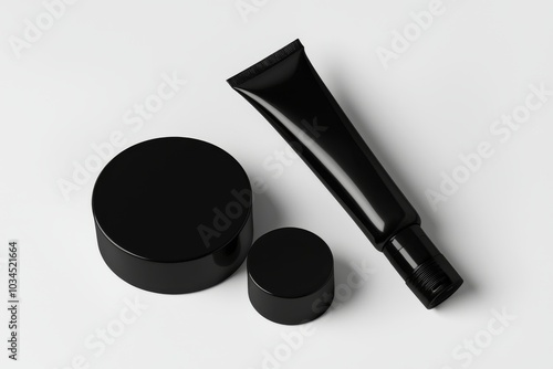 White background with a bottle with men's cosmetics, razor, and black box photo