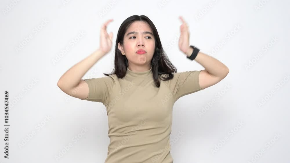 Beautiful Asian woman yawns while stretching her body, showing signs of tiredness against a white background Beautiful Asian woman yawns while stretching her body, showing signs of tiredness against a white background
