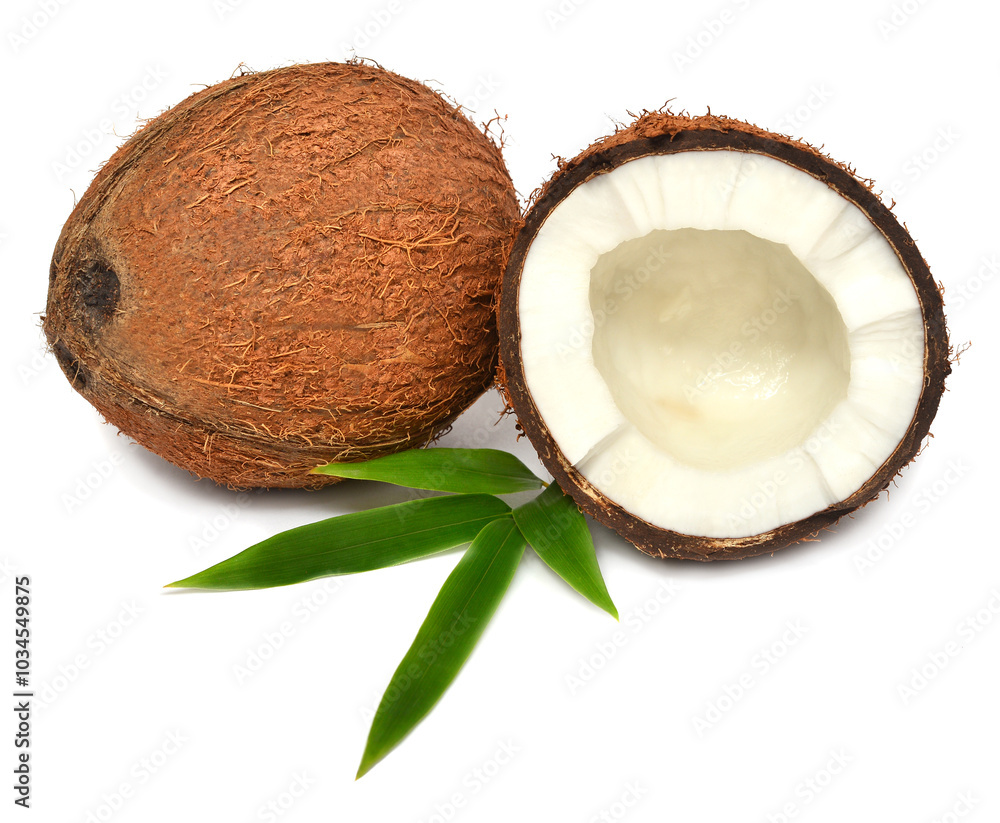 Coconuts whole and half with leaf isolated on white background. Tropical fruit Coconuts whole and half with leaf isolated on white background. Tropical fruit