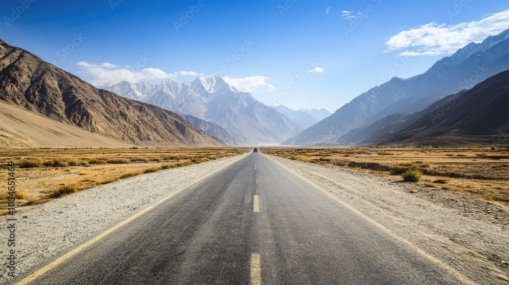 Scenic Open Road with Mountain Backdrop in Daylight Scenic Open Road with Mountain Backdrop in Daylight
