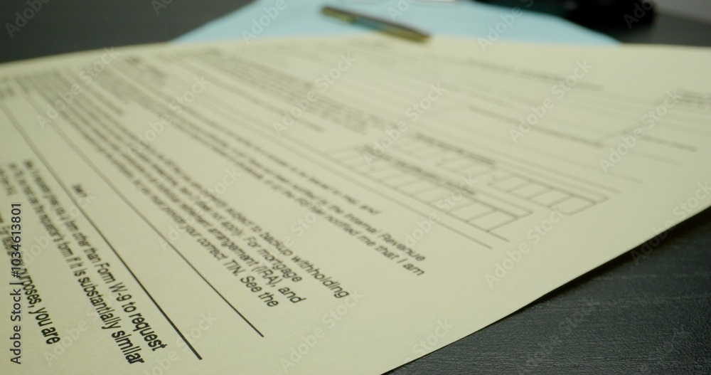 A signed employment contract. The pen is on the documents. Close-up, motion video A signed employment contract. The pen is on the documents. Close-up, motion video
