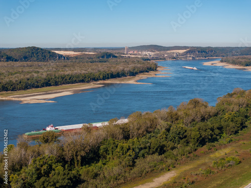 River Barges working up stream in low water on the Mississippi River. photo