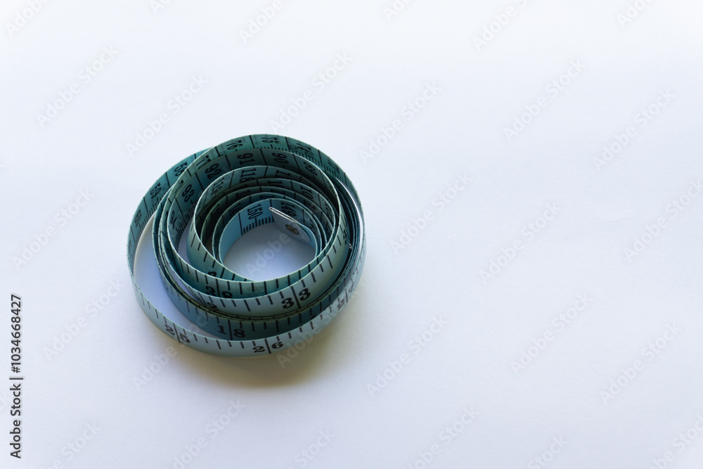 Blue measuring tape with various layouts isolated on white background. Blue measuring tape with various layouts isolated on white background.