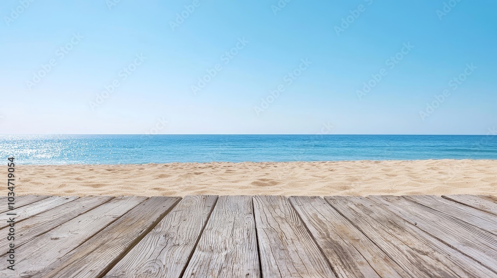 Fototapeta premium Weathered Wooden Dock on a Beach with Golden Sand and Serene Ocean View