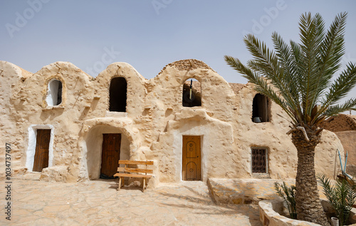 Ghorfa storage graneries of the traditional Berber mud brick fortified Ksar of Hedada or Hadada, near Tetouin, Tunisia photo