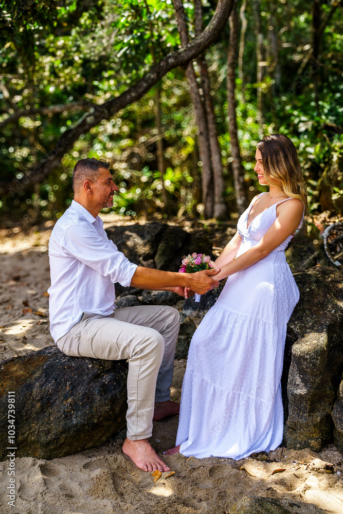 man and woman, couple, dressed in white, celebrating together, new year