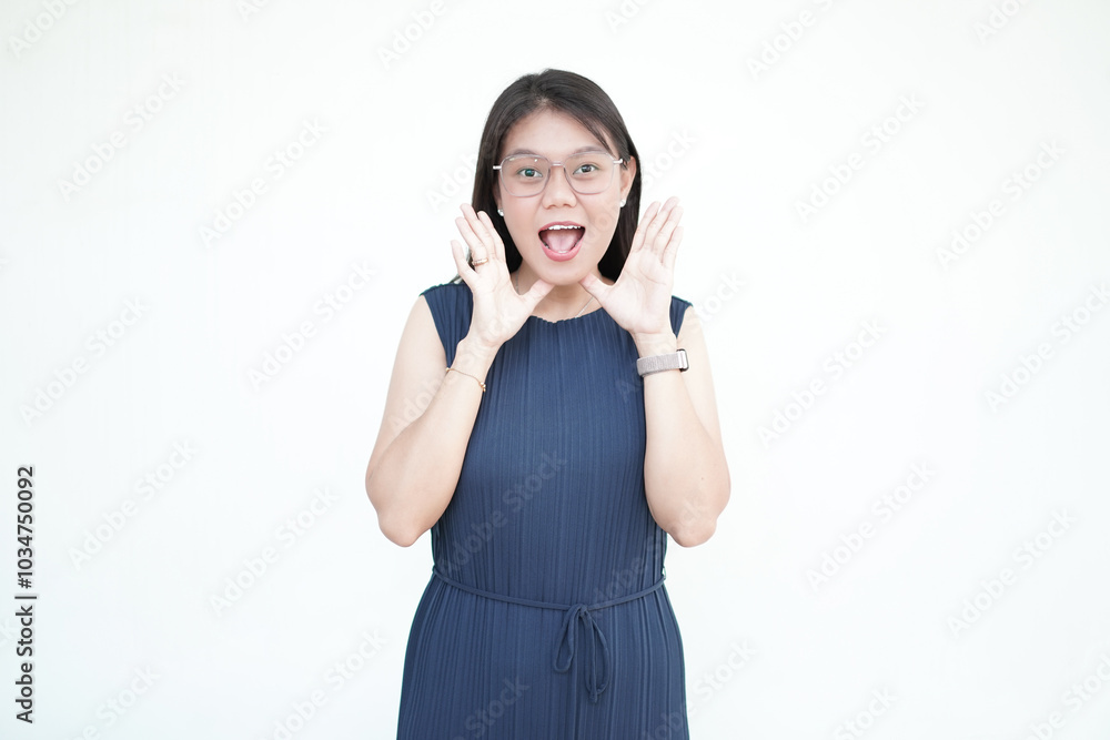 Beautiful Asian woman cups her hand over her mouth, shouting or whispering, in an ad concept on a white background Beautiful Asian woman cups her hand over her mouth, shouting or whispering, in an ad concept on a white background