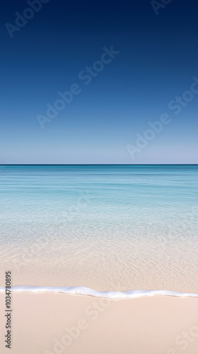 Simple beach scene with vast horizon and blue water