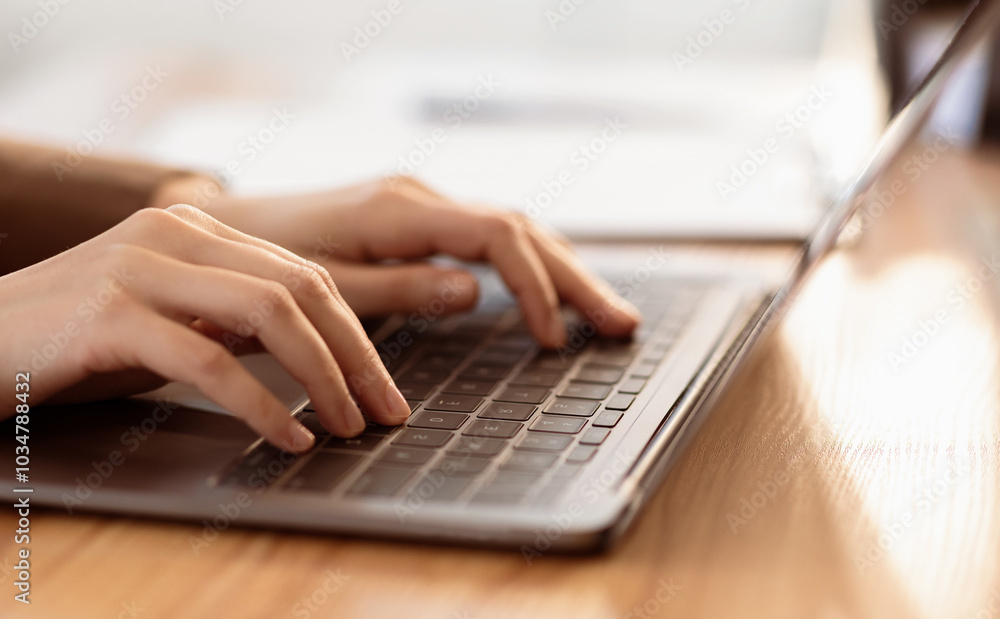 Writing Blog. Unrecognizable young woman working on laptop, searching information. Selective focus, copyspace Writing Blog. Unrecognizable young woman working on laptop, searching information. Selective focus, copyspace