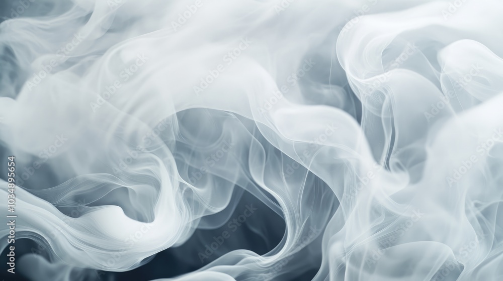 Soft undulating smoke creates an abstract backdrop in shades of white and grey Soft undulating smoke creates an abstract backdrop in shades of white and grey