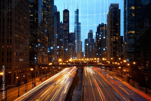 A grid of blue lines overlay a cityscape at night. The grid is made up of vertical and horizontal lines. There are cars driving along the road in the foreground. The city is lit up with lights.