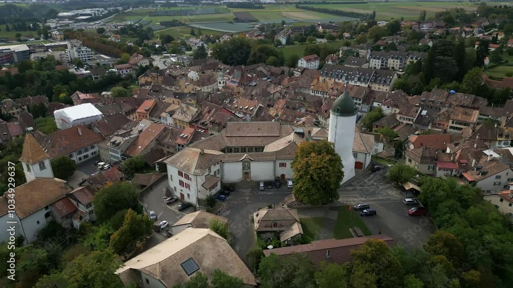 Crane up tilt down drone shot of Aubonne Castle in Canton of Vaud Switzerland Crane up tilt down drone shot of Aubonne Castle in Canton of Vaud Switzerland