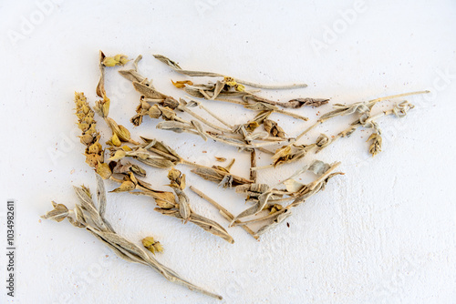 Loose Greek herbal mountain tea, isolated in a white background. photo