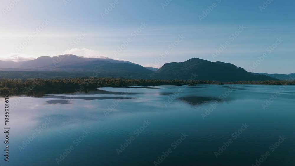 Irish landscape in autumn with nice weather by a lake and mountains in the background 4K Irish landscape in autumn with nice weather by a lake and mountains in the background 4K