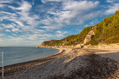 Kathisma Beach, Lefkada island, Greece, bath in beautiful warm afternoon sunlight, no people, a beautiful blue sky, and fantastic sky clouds. photo