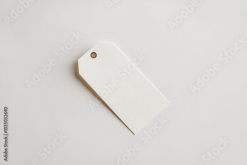 White clothing hang tag mockup blank paper cardboard price label tag with rope with sopy space photo