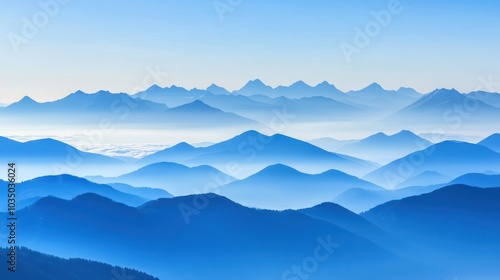 A Tranquil Landscape of Misty Blue Mountains