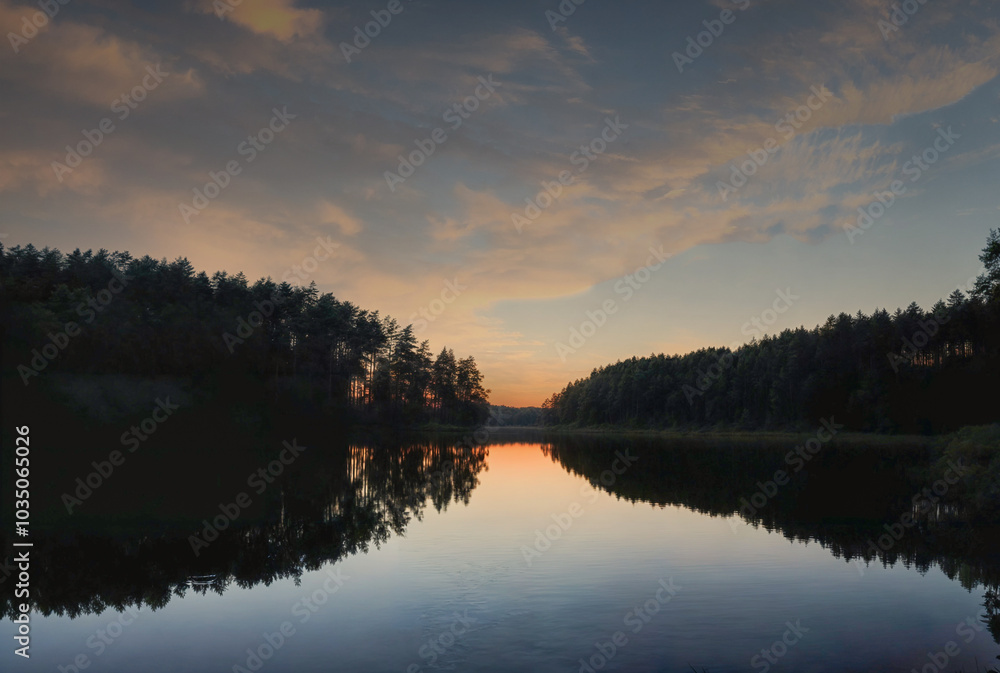 Fototapeta premium Breathtaking Serene Sunset Reflections Gracefully Dancing Over Calm and Peaceful Waters
