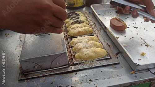 a very legendary Indonesian snack: Pukis photo