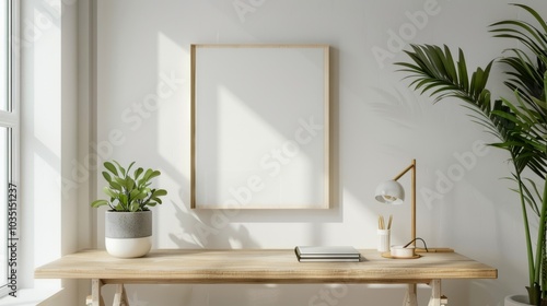 A contemporary minimalist home office with a wooden desk and white walls. A blank picture frame is the focal point, with minimal decor like a sleek notebook. Soft
