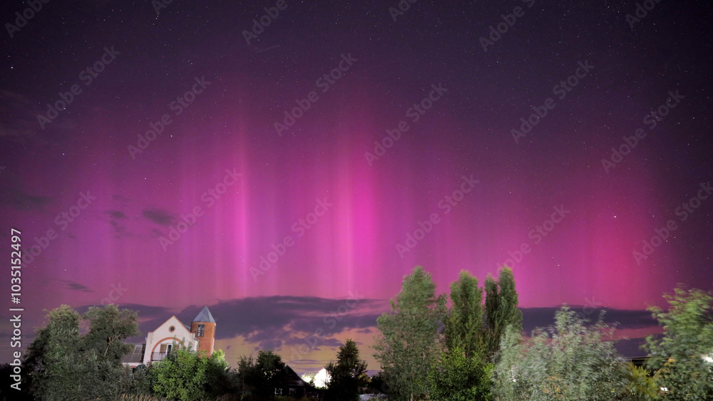 Aurora borealis Amazing Night Starry Sky. Bright Dramatic Perseids meteors Trails Of Stars And Meteors. Sky In Different Colors. From Dusk Till Dawn. Misty Night. Natural Background