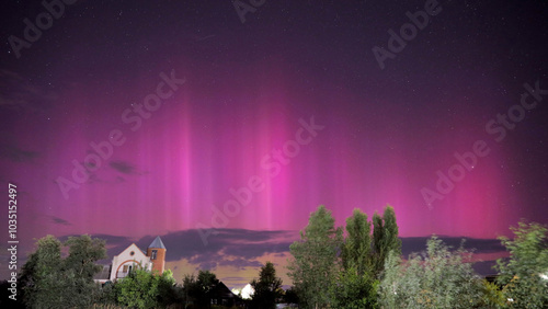 Obraz na płótnie Aurora borealis Amazing Night Starry Sky. Bright Dramatic Perseids meteors Trails Of Stars And Meteors. Sky In Different Colors. From Dusk Till Dawn. Misty Night. Natural Background w salonie