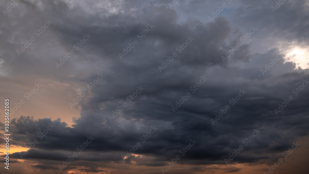 Obraz premium Dark sky with stormy clouds. Dramatic sky rain,Dark clouds before a thunder-storm.