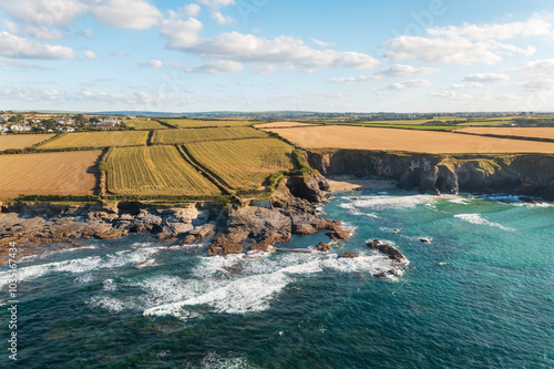 Aerial view of Trevone Seapool with rugged cliffs and tranquil waves, Padstow, United Kingdom. photo