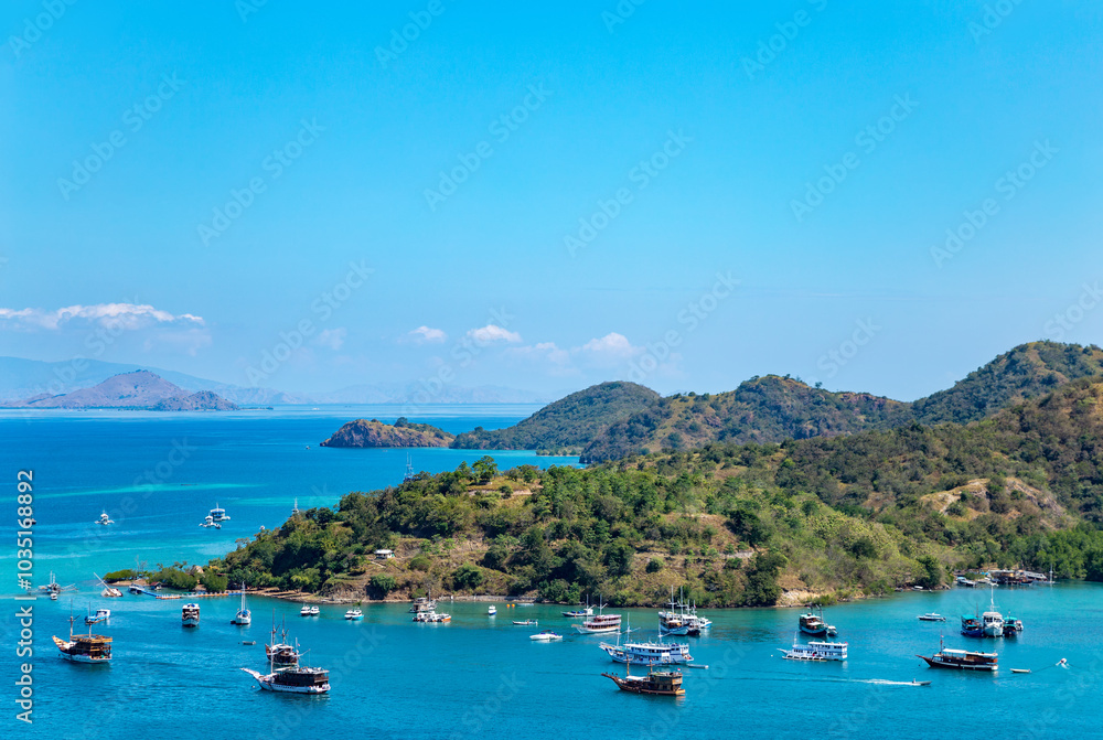 Islands Bajo, Kelapa and Seture in harbour of Labuan Bajo, Ost Nusa Tenggara, Flores, Indonesia, Southeast Asia. Islands Bajo, Kelapa and Seture in harbour of Labuan Bajo, Ost Nusa Tenggara, Flores, Indonesia, Southeast Asia.