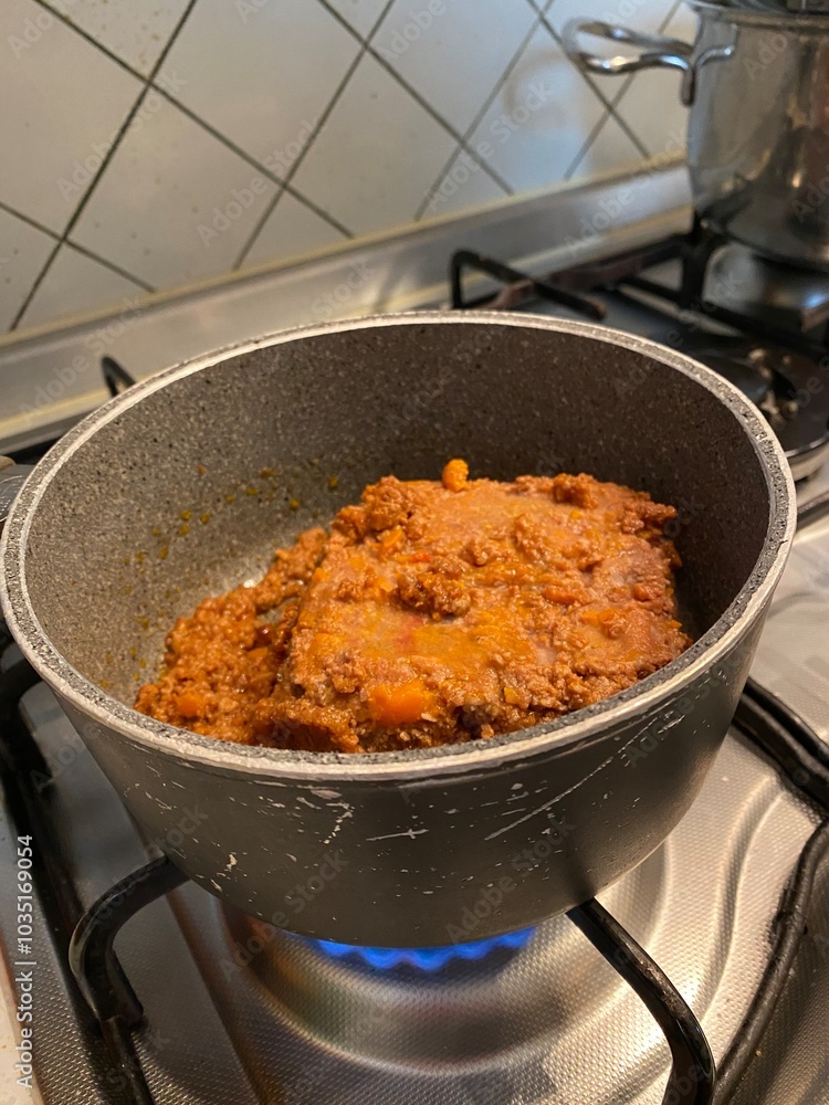 homemade ragu alla bolognesa with carrots, celery, tomate homemade ragu alla bolognesa with carrots, celery, tomate