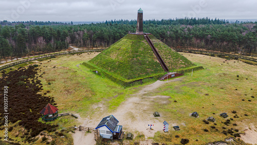 Aerial view of the historic Pyramid Van Austerlitz surrounded by lush green forest and scenic pathways, Woudenberg, The Netherlands. photo