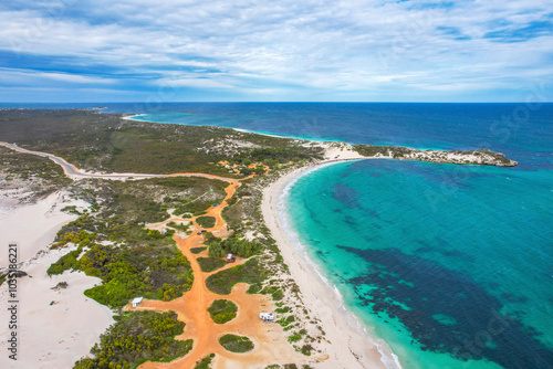 Aerial view of pristine sandy cape beach with beautiful blue water and rugged coastline, Jurien Bay, Australia. photo