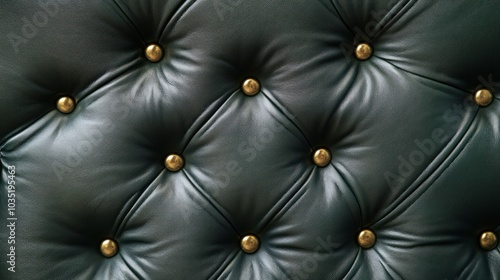 Luxurious Deep Green Leather Upholstery with Gold Studs photo