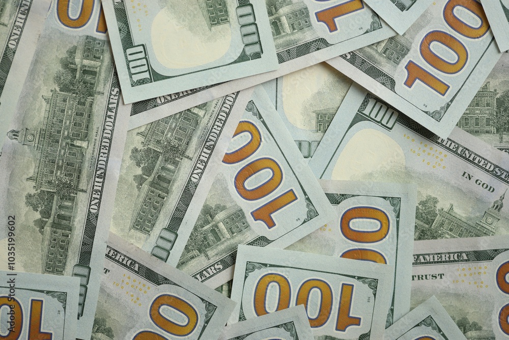 Big amount of american USD hunderd dollar bills banknotes close up Big amount of american USD hunderd dollar bills banknotes close up