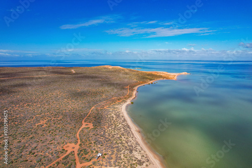 Aerial view of the serene coastline and pristine beach with vast ocean, Eagle Bluff Lookout, Shark Bay, Western Australia, Australia. photo