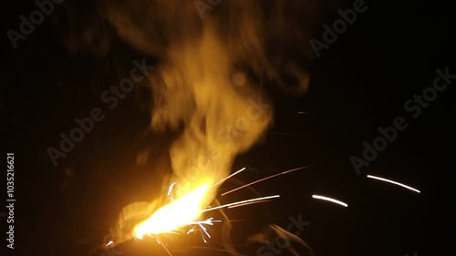 close up shot of a sparkler in the dark