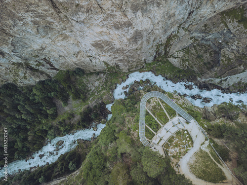 Aerial view of the beautiful Orrido di Pre-Saint-Didier with a river, rugged cliffs, and lush forests, Pre-Saint-Didier, Italy. photo