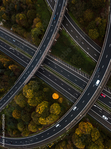 Aerial view of busy highway intersection with winding roads and traffic, Thorpe, England. photo